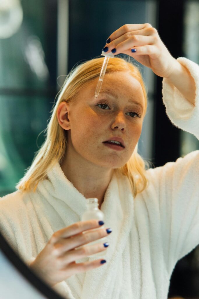 Woman Putting Moisturizer on her Face