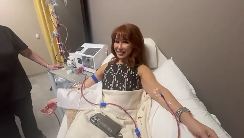 Mariann Tran receiving EBOO Ozone Therapy at wellness revolution texas