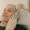 Middle-aged woman receiving cosmetic facial injection